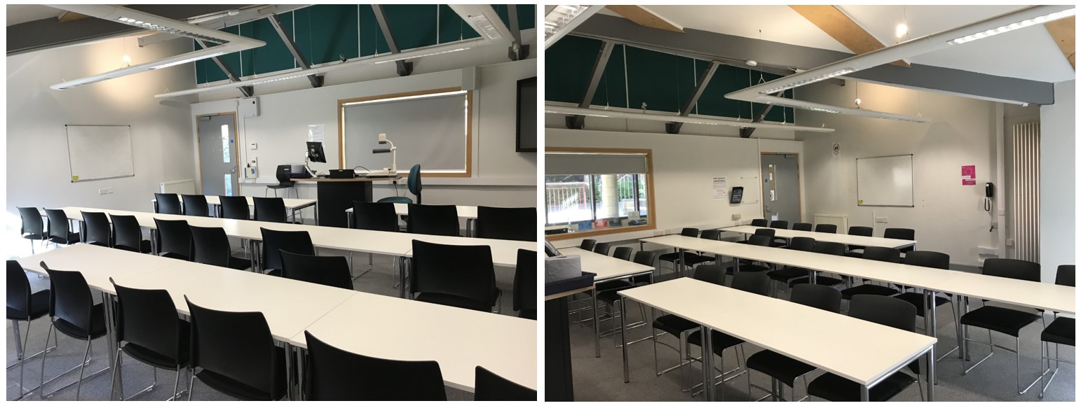 Rows of tables and chairs facing the teaching wall